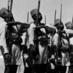 Soldats du deuxième bataillon de marche des Forces françaises libres en avril 1941 à Qastina, en Palestine, qui combattent les troupes du régime de Vichy. Tous sont Centrafricains. © Ordre de la Libération